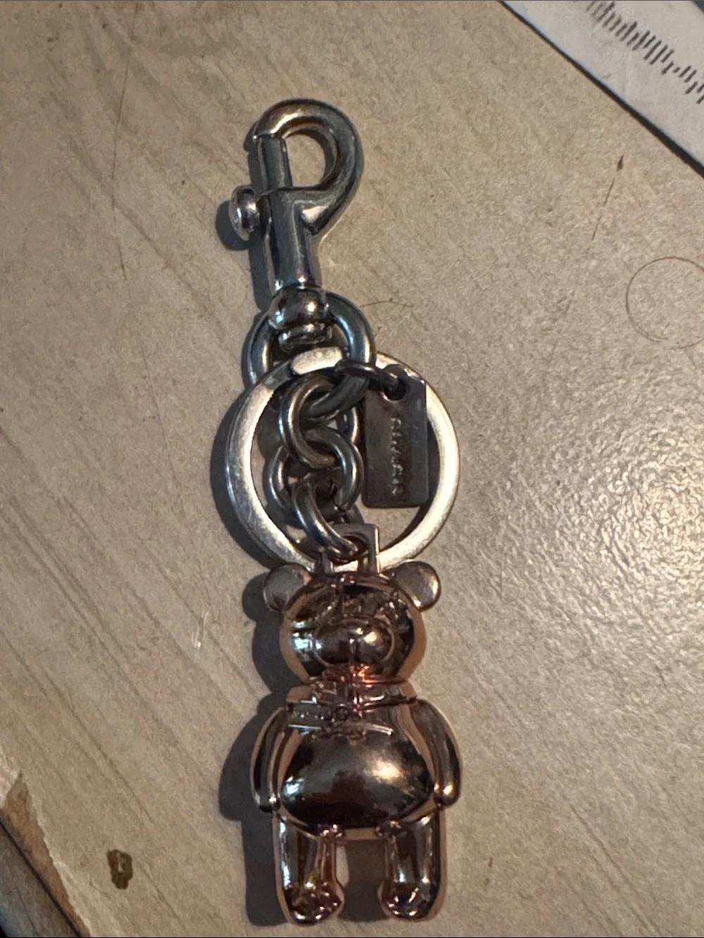 Coach Rose Gold Teddy Bear Keychain Charm